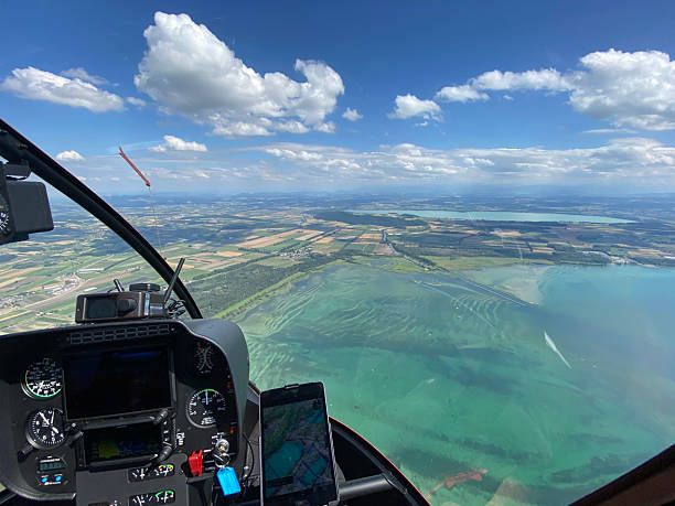 istock Alpine helicopter flies over mountains, cockpit view 2228334182
