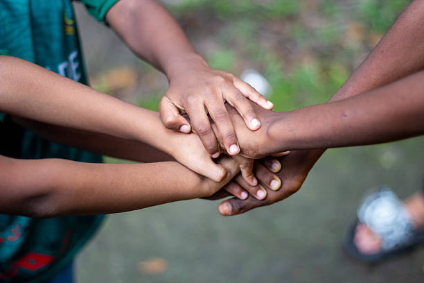 istock Many hands joined together for a partnership 2228334941