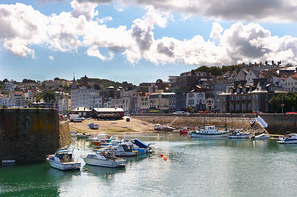 St Peter Port, Guernsey, Channel Islands. St. Peter Port is a town and one of the ten parishes on the island of Guernsey in the Channel Islands. It is the capital of the Bailiwick of Guernsey as well as the main port.