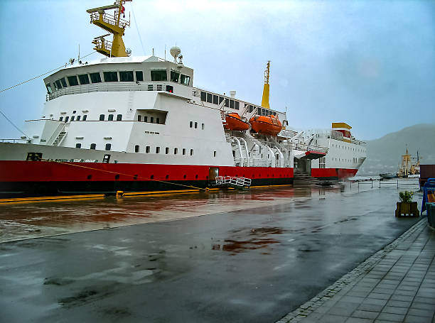 Passenger Cruise ferry Docked at Stamsund Norway after an afternoon rain