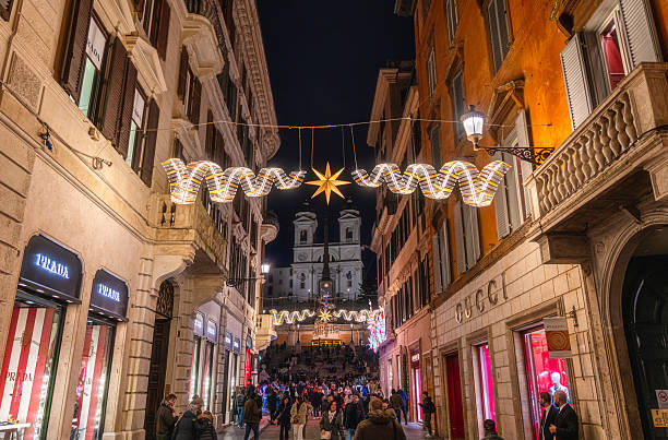 Rome, Italy - December 14: Panoramic view of the Piazza di Spagna in Rome, Italy. Taken during the Christmas holidays. Christmas-themed nighttime cityscape.