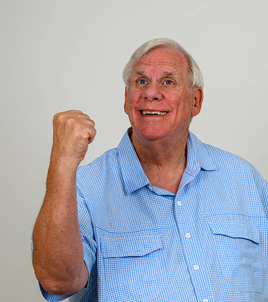 A distraught senior adult man is reading a simulated USA Social Security and/or financial planning information document titled: \