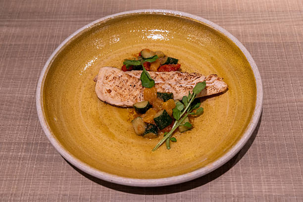 Grilled chicken breast with summer vegetable.