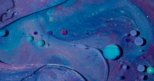 istock Oil fluid ink art color flow glitter liquid round 2228351577