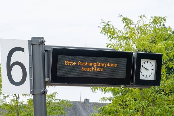 istock Display showing please note the posted timetables at bus stop 2228351798