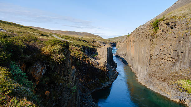 istock Majestic Studlagil Canyon in Iceland showcasing stunning basalt columns and serene river flow 2228352755
