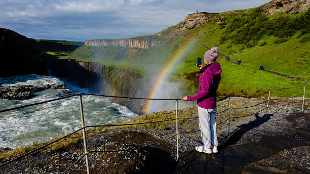 istock Explore the stunning rainbow at Gullfoss waterfall in Iceland on a bright sunny day 2228353895