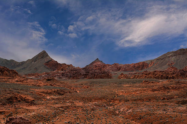 Desert Landscape Shot with Distant Mountains of the Terracotta Mojave Desert in the Valley of Fire Nevada on Semi-cloudy Day