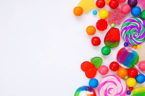 istock Colorful candy side border over a white background 2228360879