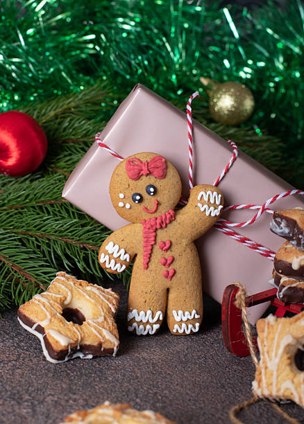 istock Cookies Gingerbread man on festive new year background 2228362355