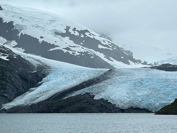 istock Portage Glacier Alaska with Snow Capped Mountain in Background 2228367388