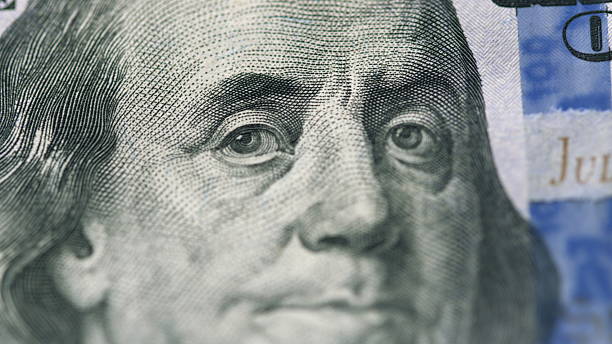 istock This is a detailed closeup image of a Hundred Dollar Bill, prominently featuring Benjamin Franklin 2228367666