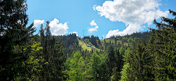 View of the Ruhestein ski jump at Ruhestein near Baiersbronn. Surrounded by fir trees in the Black Forest