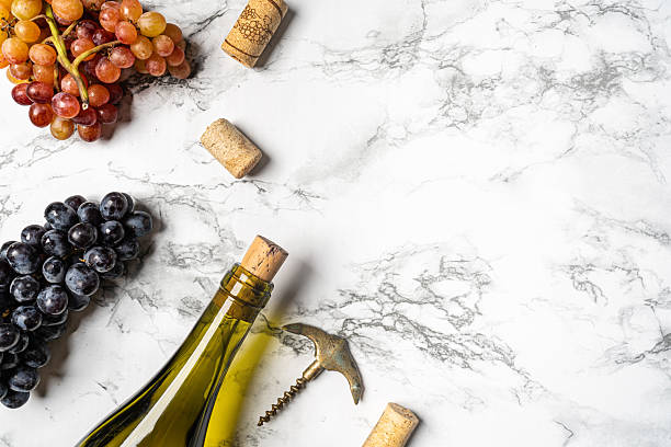 istock Bottle of wine with fresh grapes 2228376120