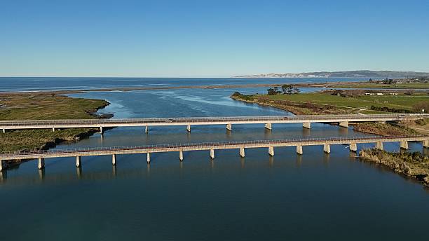 istock Scenic bridge over river with clear skies 2228376613