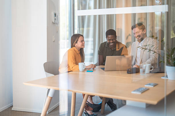 istock Diverse Business Professionals Collaborating in a Contemporary Office Setting 2228377017
