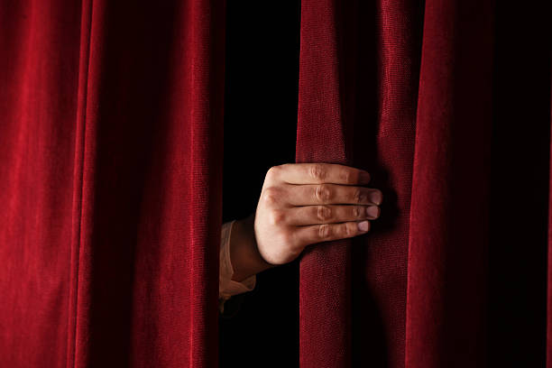 Female politician speaks to audiences under spotlights