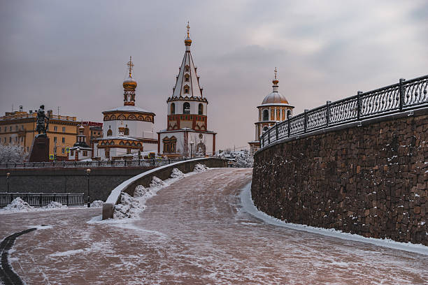 istock Winter view of historic Irkutsk architecture with snow-covered pathway 2228382931
