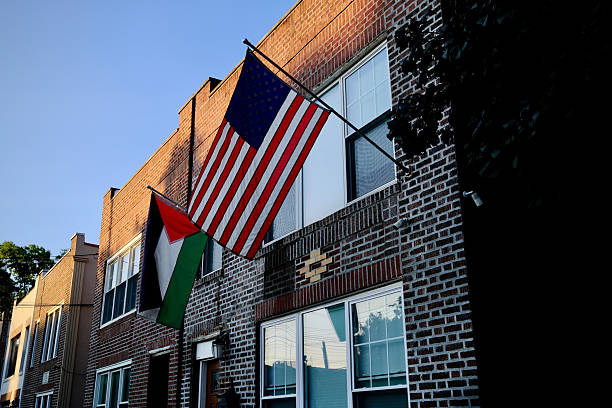 istock Queens Home With American and Palestinian Flags (Queens, New York, USA) 2228383536