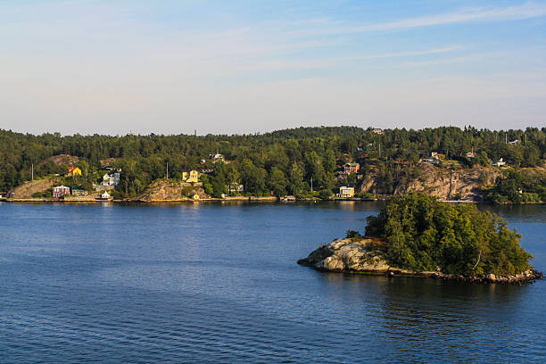 Homes along the coast of the Stockholm Archipelago, an island chain,  which is the largest archipelago in Sweden, and the second-largest archipelago in the Baltic Sea. The region is popular amongst inhabitants of Stockholm for owning vacation homes.
