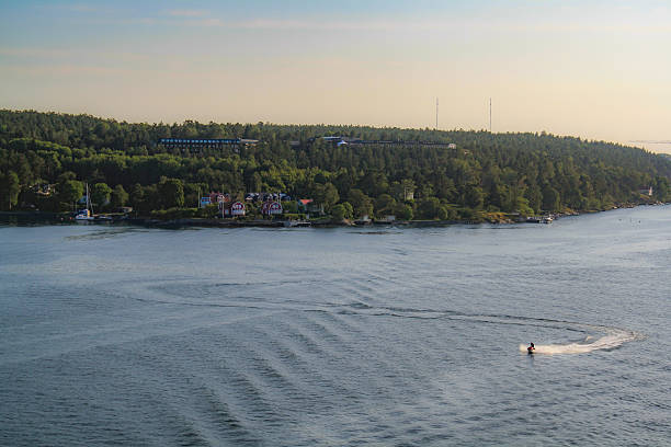 Homes along the coast of the Stockholm Archipelago, an island chain,  which is the largest archipelago in Sweden, and the second-largest archipelago in the Baltic Sea. The region is popular amongst inhabitants of Stockholm for owning vacation homes.