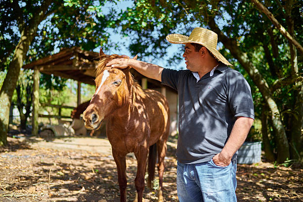 istock Latin farmer and his horse 2228386707
