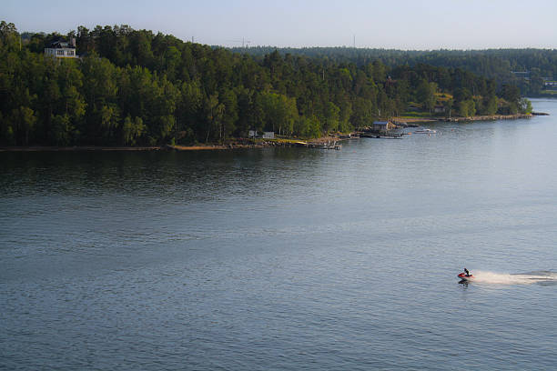 Homes along the coast of the Stockholm Archipelago, an island chain,  which is the largest archipelago in Sweden, and the second-largest archipelago in the Baltic Sea. The region is popular amongst inhabitants of Stockholm for owning vacation homes.
