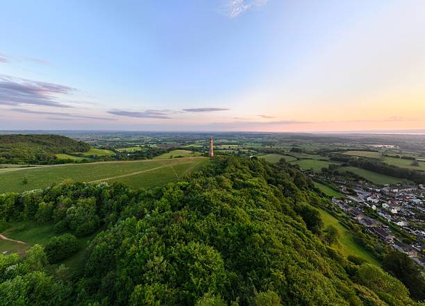 istock Glastonbury Tor and lush countryside at sunset. 2228390338