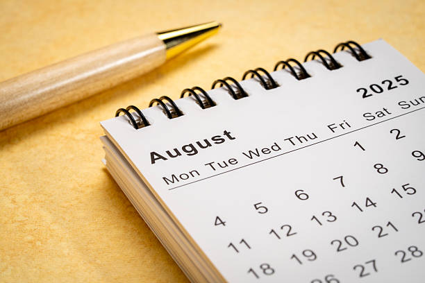 istock August 2025 - small spiral desktop calendar, time and business concept 2228391643