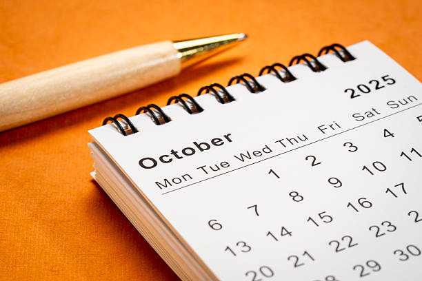 istock October 2025 - small spiral desktop calendar, time and business concept 2228391651