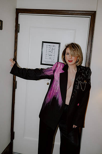 istock A Chic Fashion Statement Highlighted in an EyeCatching Black and Pink Ensemble Outfit 2228397461