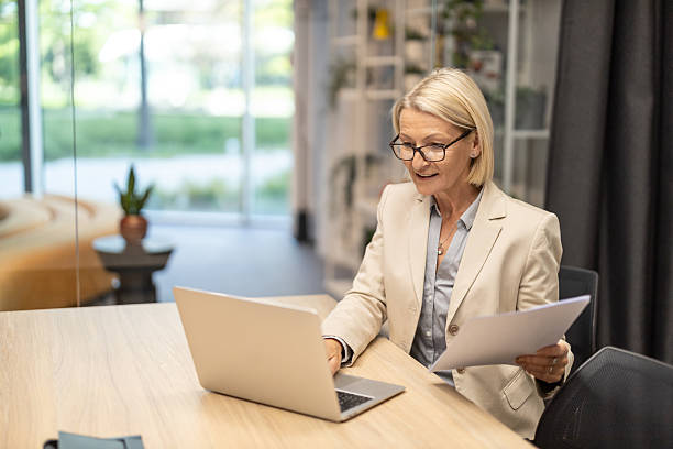 istock Professional Woman Working on Laptop at Modern Office 2228400241
