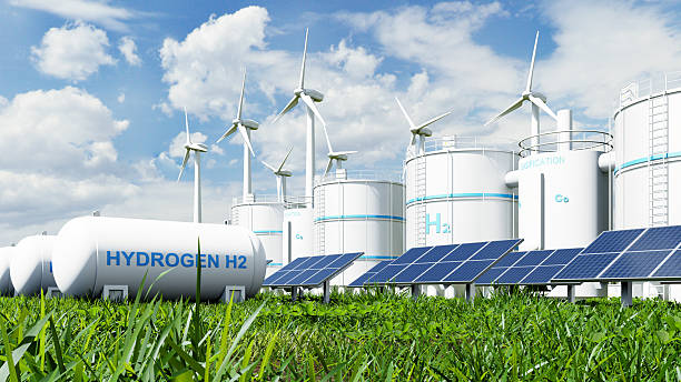 istock Hydrogen energy plant with wind turbines and solar panels- 3D rendering 2228401765