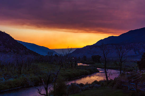 istock Sunset Over River Valley with Smoke-Hazed Sky 2228408872