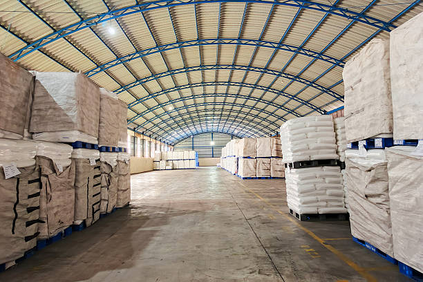 istock Wide Angle Detail Warehouse Filled With White Sack on Pallets 2228410303