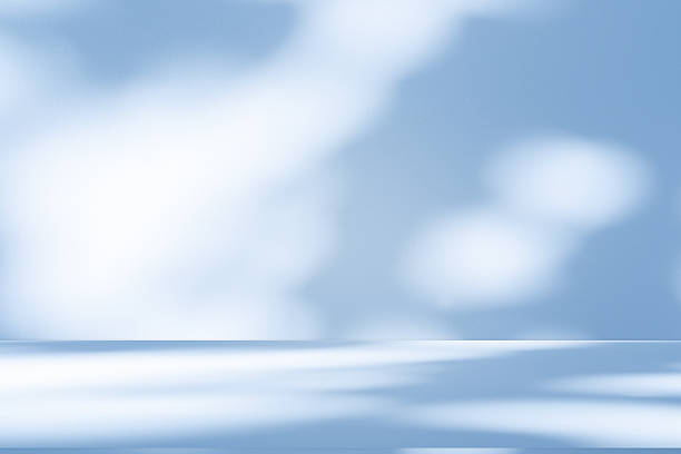 istock Studio style background wall decoration presentation uses white and blue tones. with shadows cast from a nearby window, concept creating a decorative 2228410484