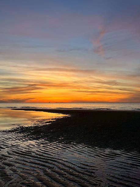 istock sea and beach in the morning 2228424245