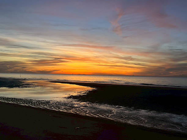 istock sea and beach in the morning 2228424313