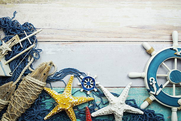 Nautical and summer background top view on wooden background