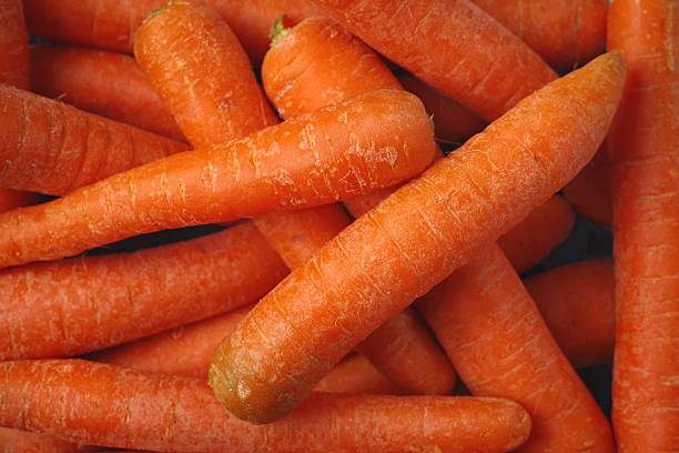 istock Fresh organic carrots shot from above. Background texture. 2228425119