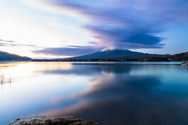 istock Sunrise Symphony: Reflection of Mount Fuji with Glowing Cloud on Lake Surface 2228427506