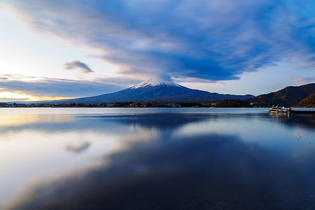 istock Sunrise Symphony: Reflection of Mount Fuji with Glowing Cloud on Lake Surface 2228427520