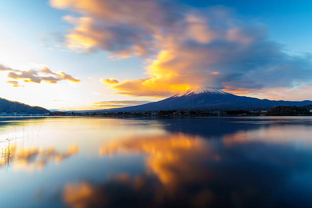 istock Sunrise Symphony: Reflection of Mount Fuji with Glowing Cloud on Lake Surface 2228427554