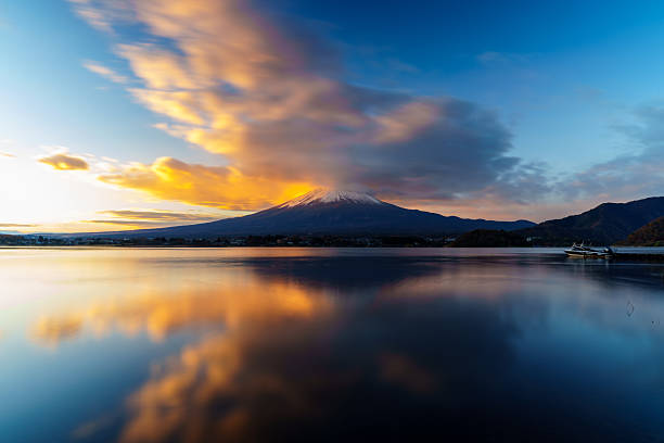 istock Sunrise Symphony: Reflection of Mount Fuji with Glowing Cloud on Lake Surface 2228427584