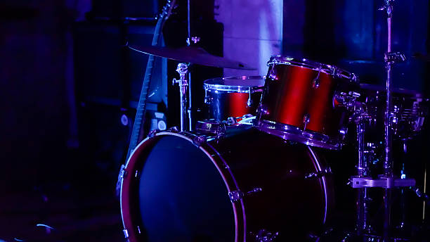 istock drums in the foreground on a stage 2228428794