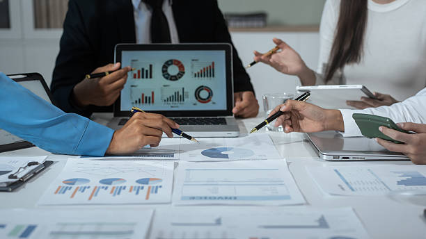 istock Entrepreneurs, marketers, managers, and financial analysts gather around the table to analyze data, present results, plan strategies, discuss efficiencies,grow their businesses through collaboration 2228429833