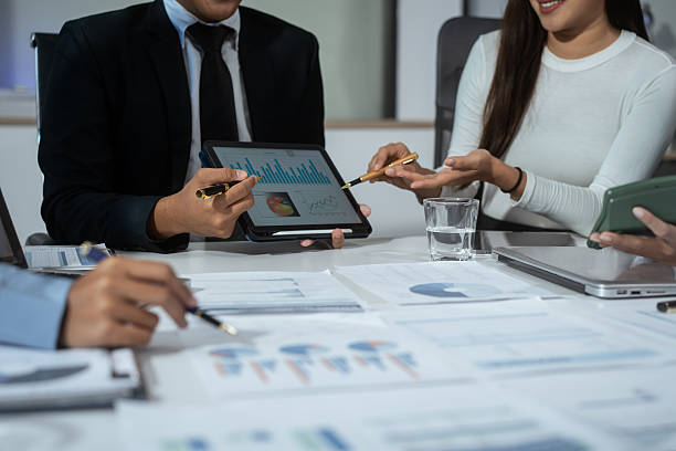 istock Entrepreneurs, marketers, managers, and financial analysts gather around the table to analyze data, present results, plan strategies, discuss efficiencies,grow their businesses through collaboration 2228429844