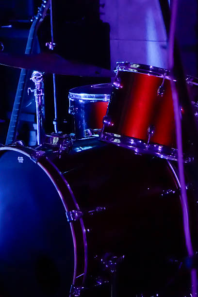 istock drums in the foreground on a stage, vertical 2228429970