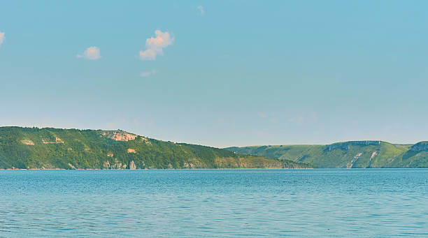istock Water big summer expanse.Resting,camping,relax on river among hills 2228430551