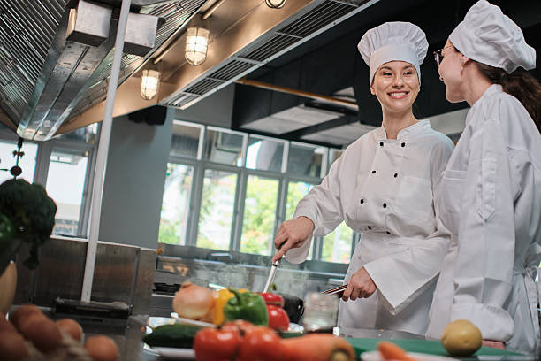 istock Two White female chefs are cooking in the restaurant kitchen together. 2228430854